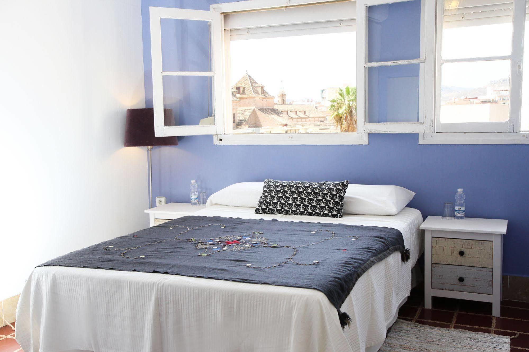 Villa Alicia Guest House Málaga Exterior foto A bedroom